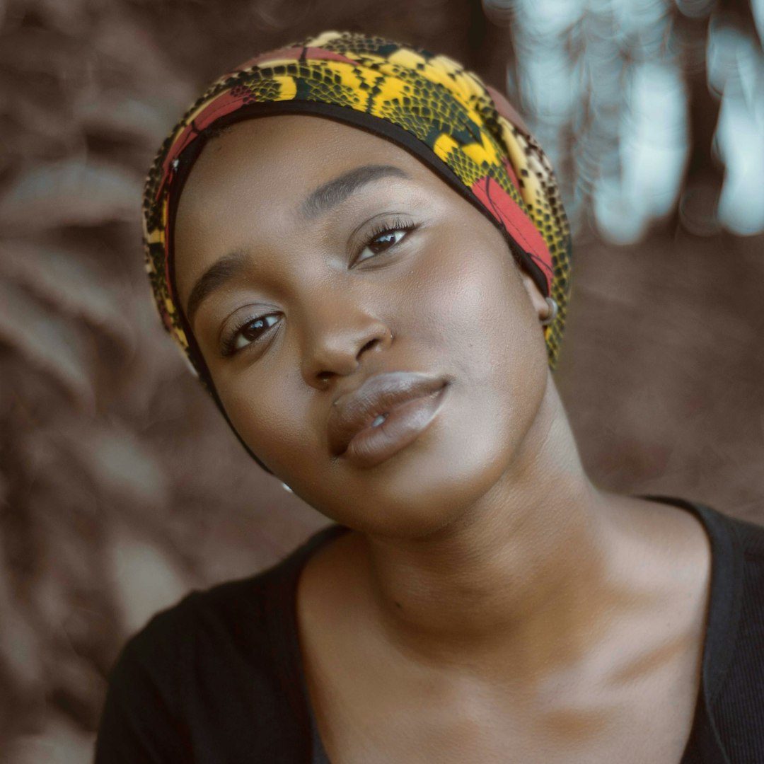 Photo by Prince Akachi selective focus photography of woman wearing black top